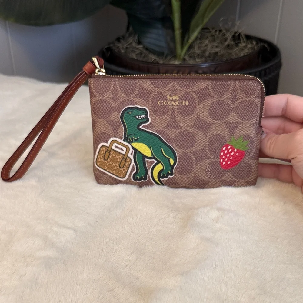 Coach Wristlet with Rexy and Travel Motifs - Picture 2 of 4